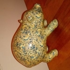 Vintage porcelain pig with blue farm animals decorating it's entirety